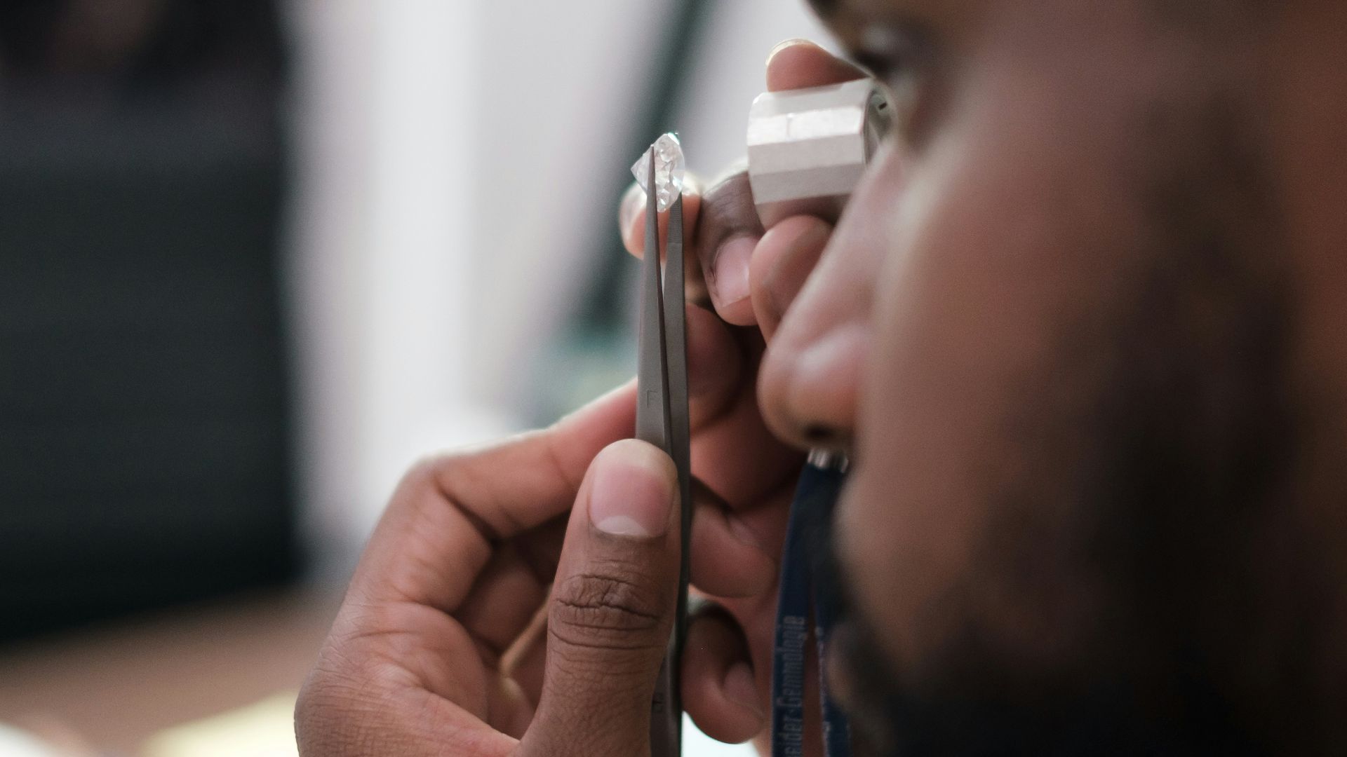 a man using a stethoscope to examine a person's ear