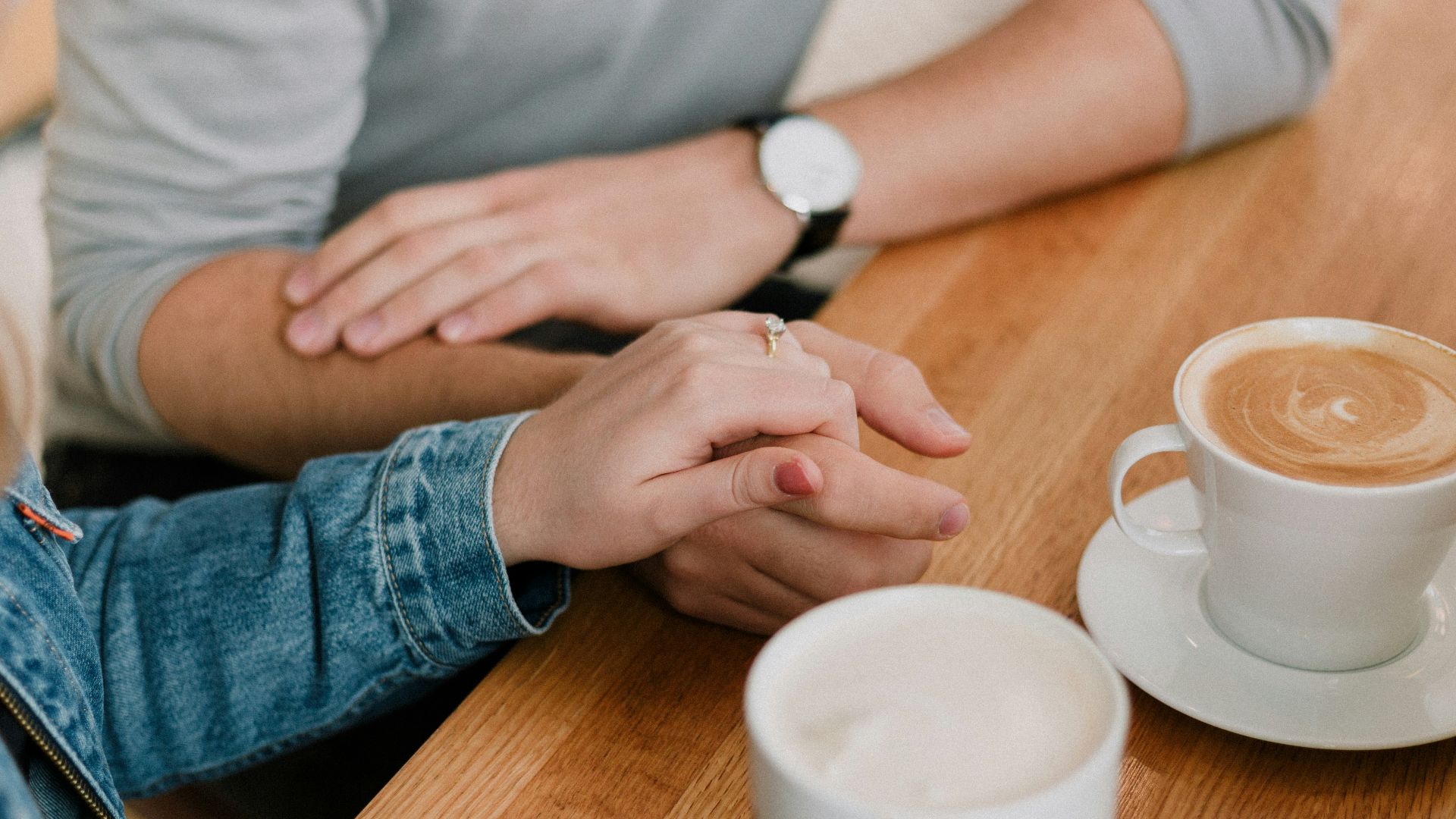 man and woman holding hands