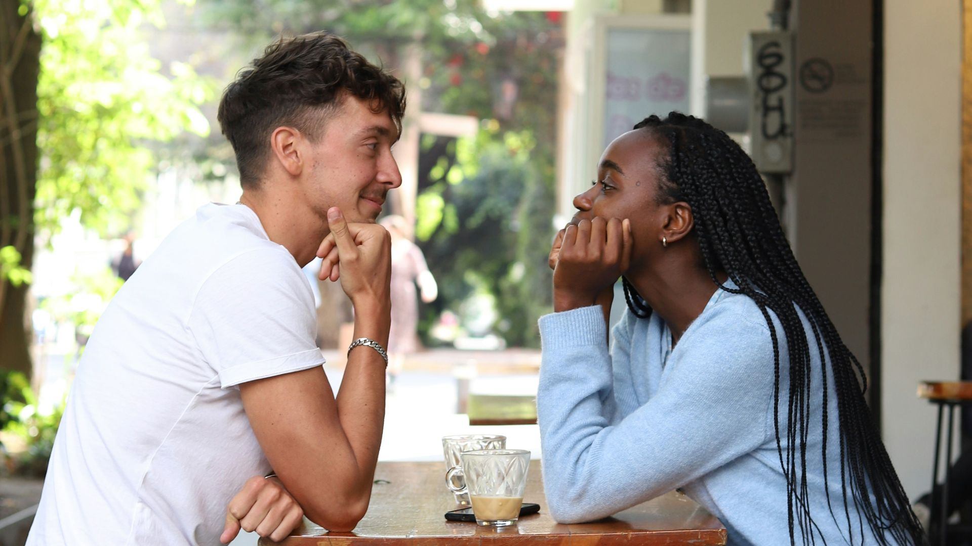 a man and a woman sitting at a table
