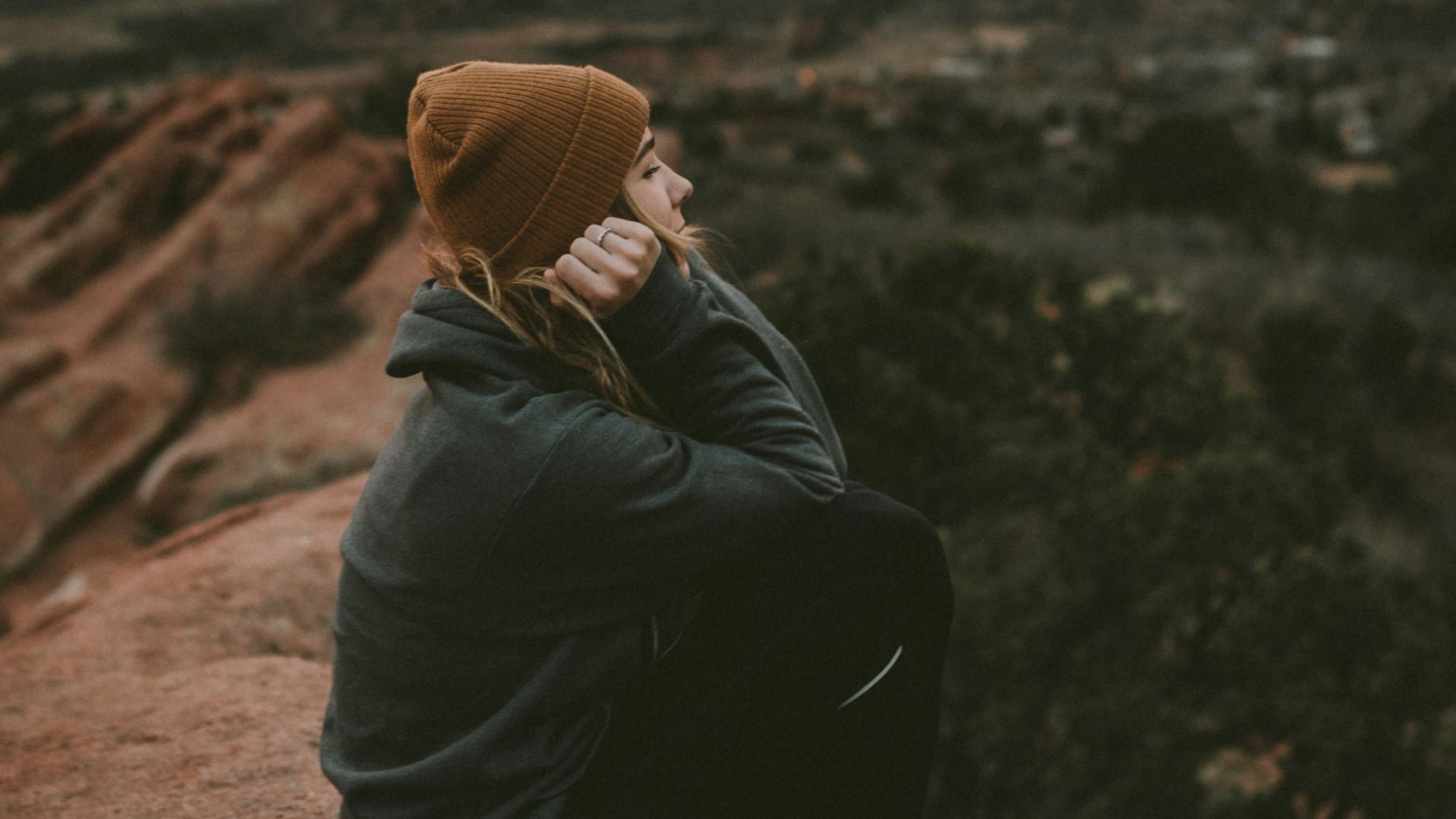 woman in green jacket