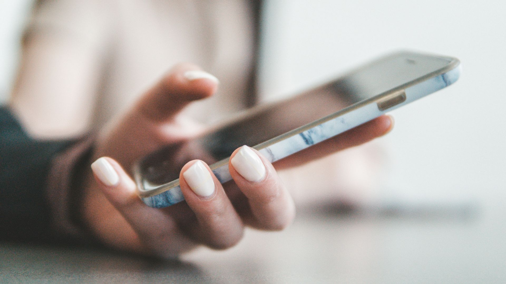 person holding black smartphone