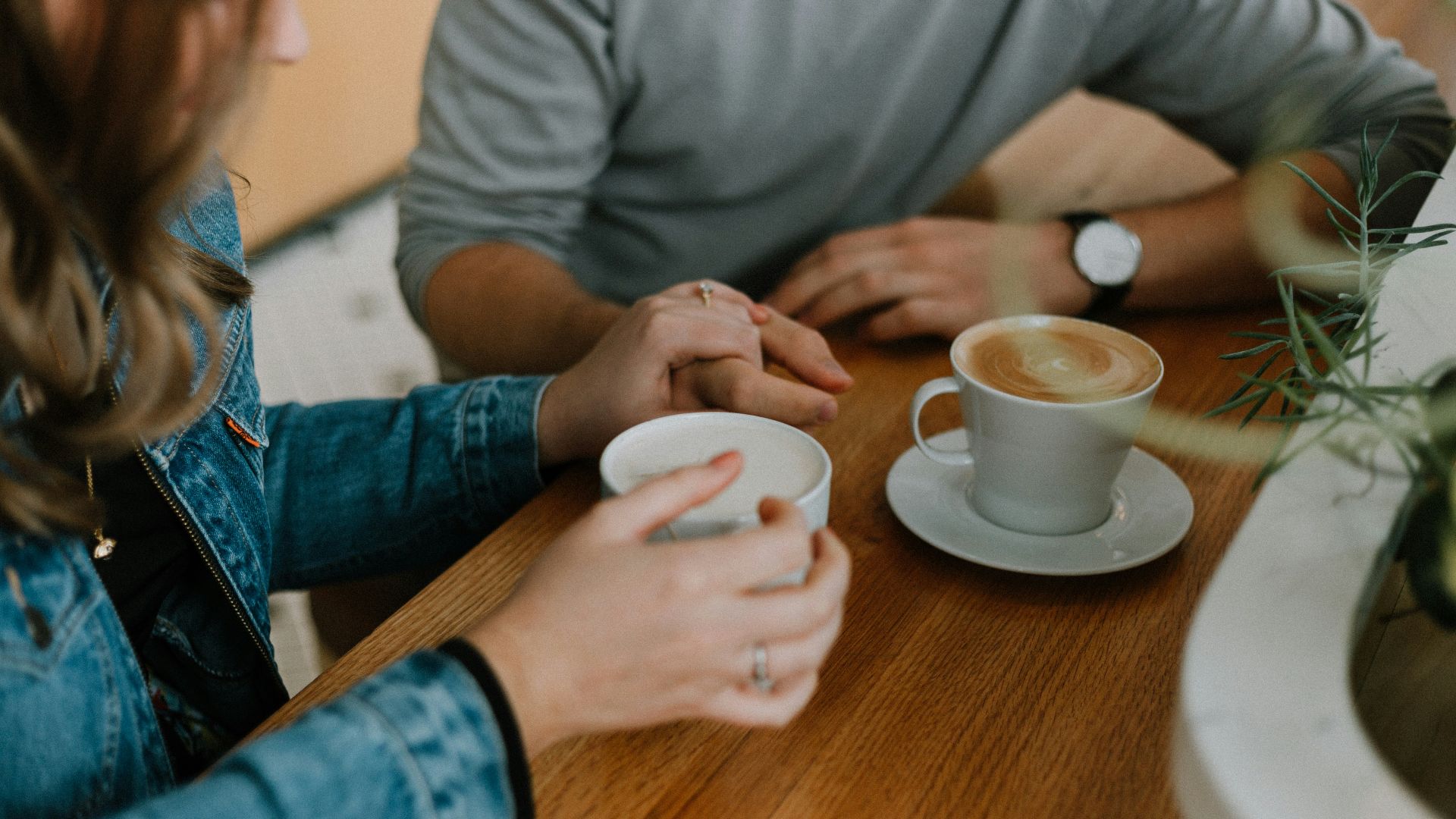 two mugs with coffee on table
