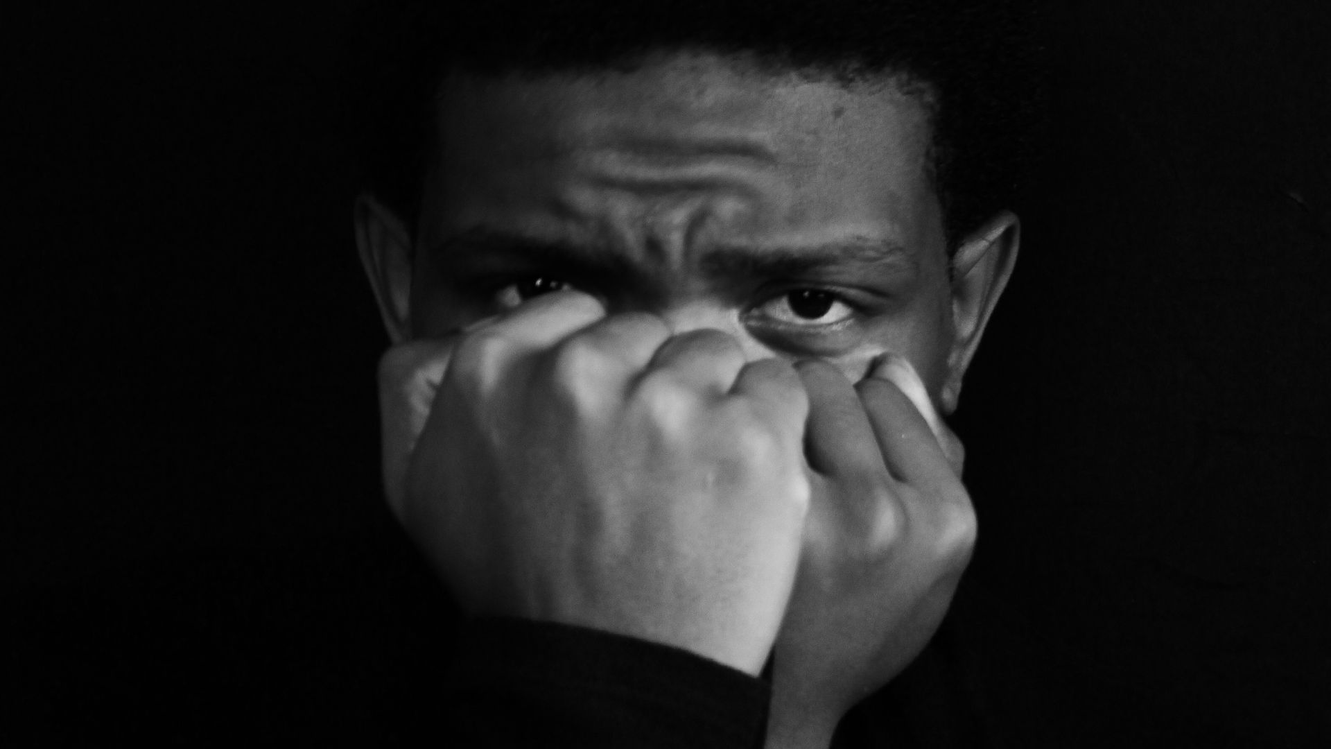 man in black sweater