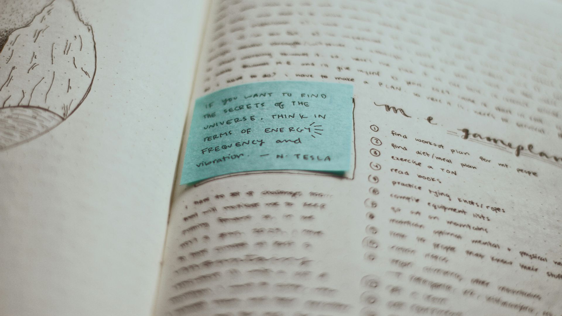 blue card on top of opened book