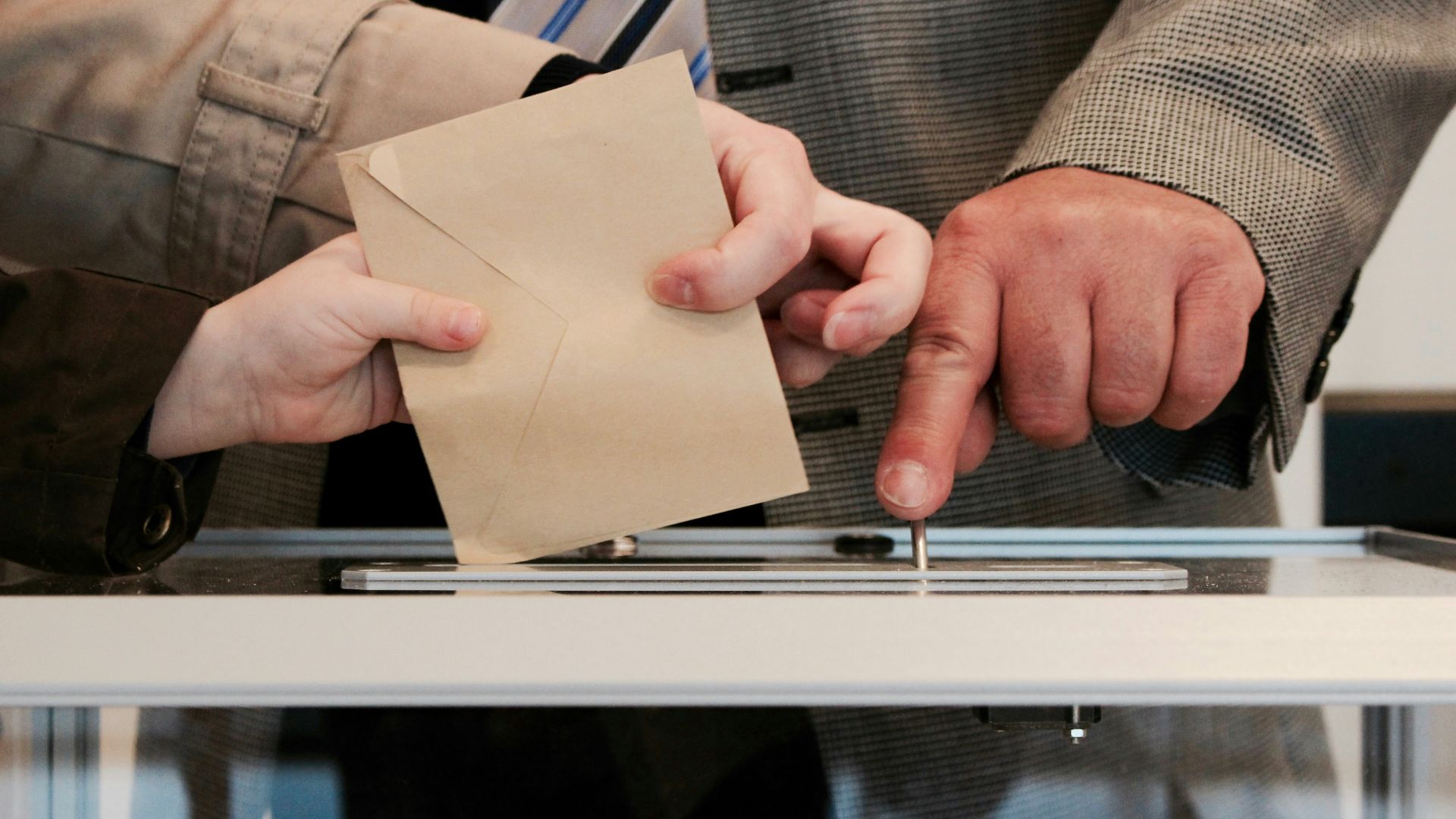 person standing near table