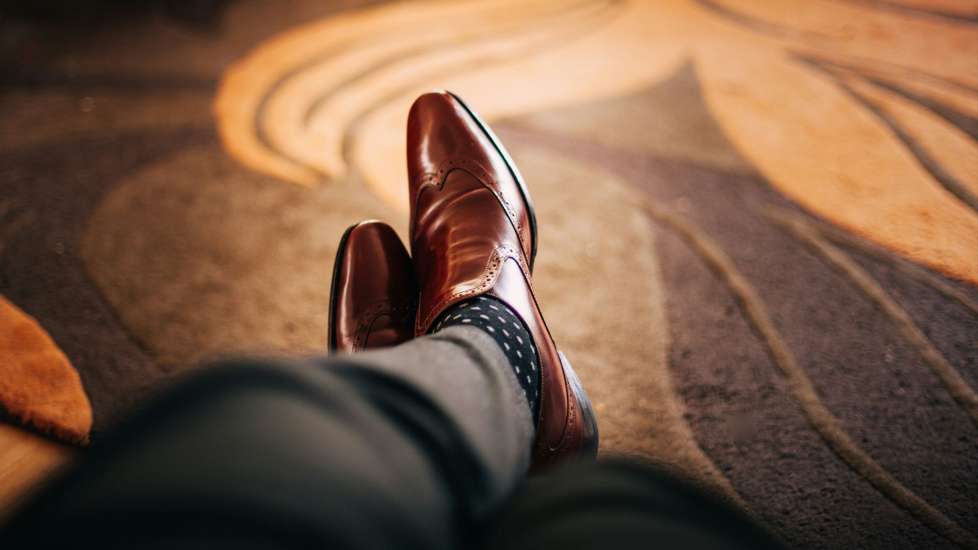 pair of brown leather dress shoes