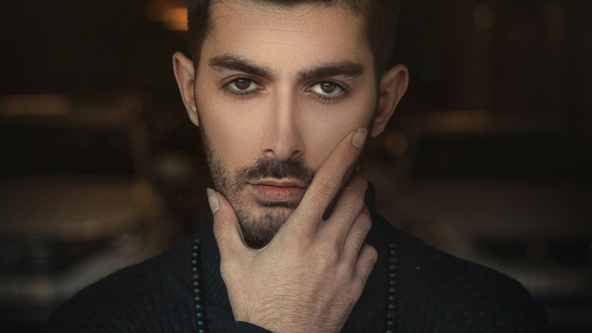 man in black long sleeve shirt