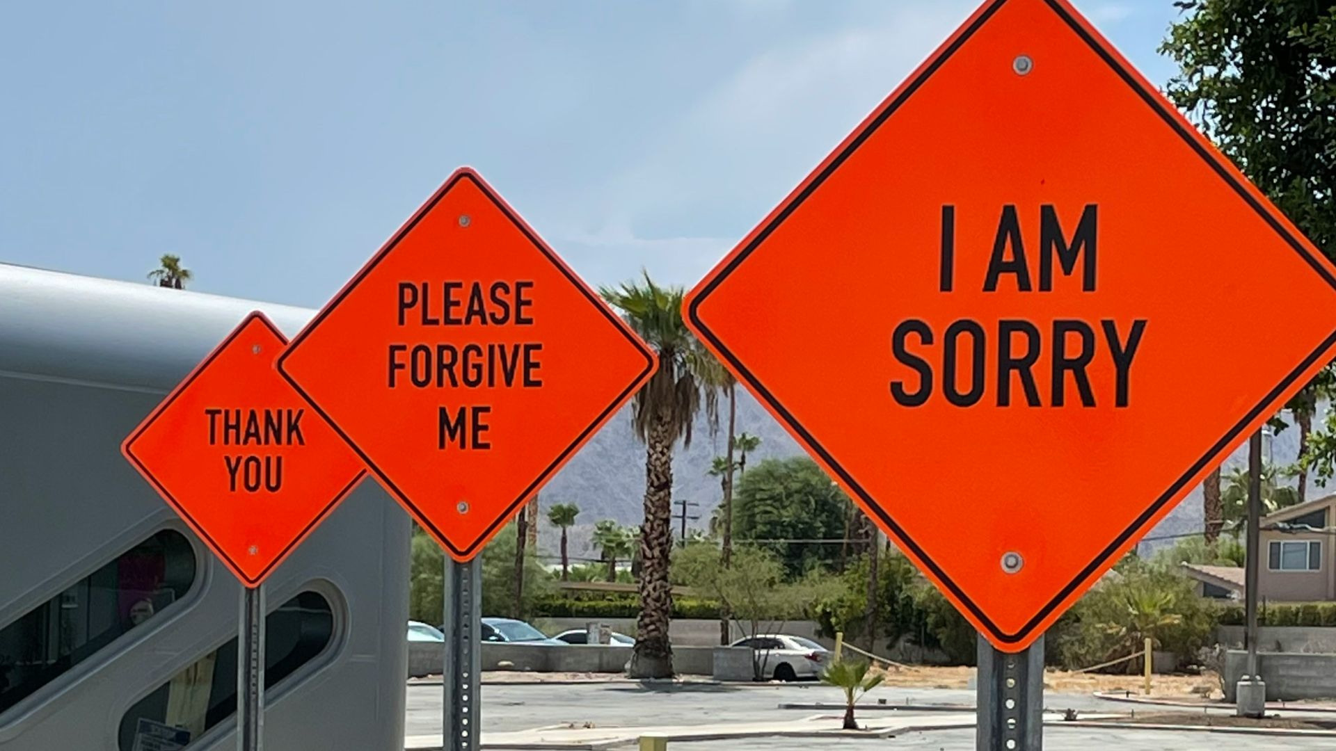 white and red street sign