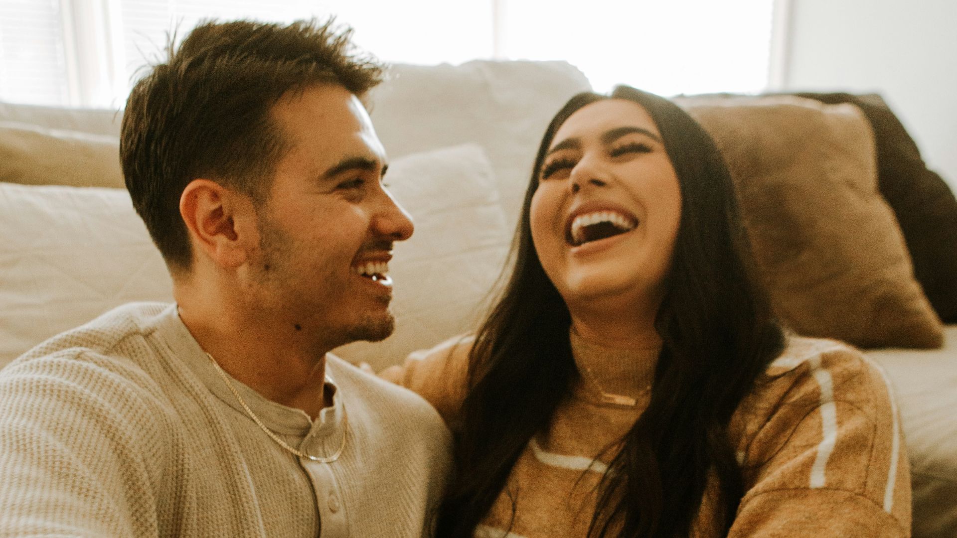 a man and woman laughing