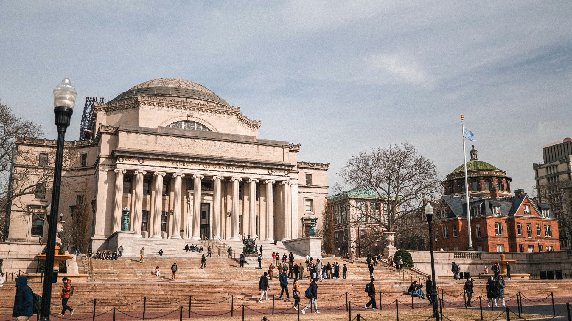 a group of people standing in front of a building