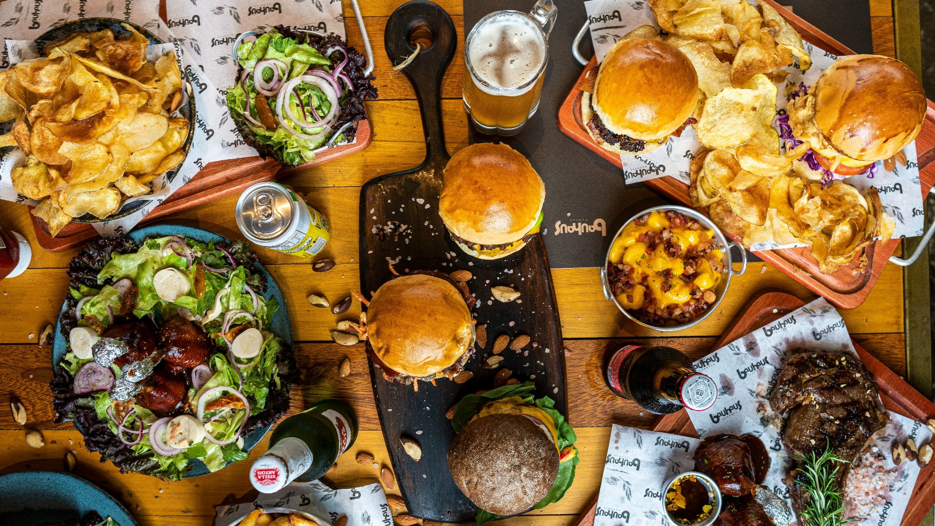 a wooden table topped with lots of food