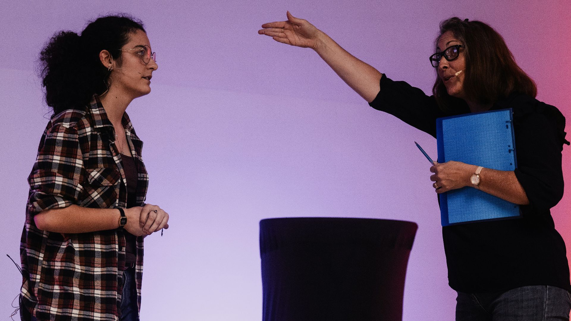A couple of women standing next to each other