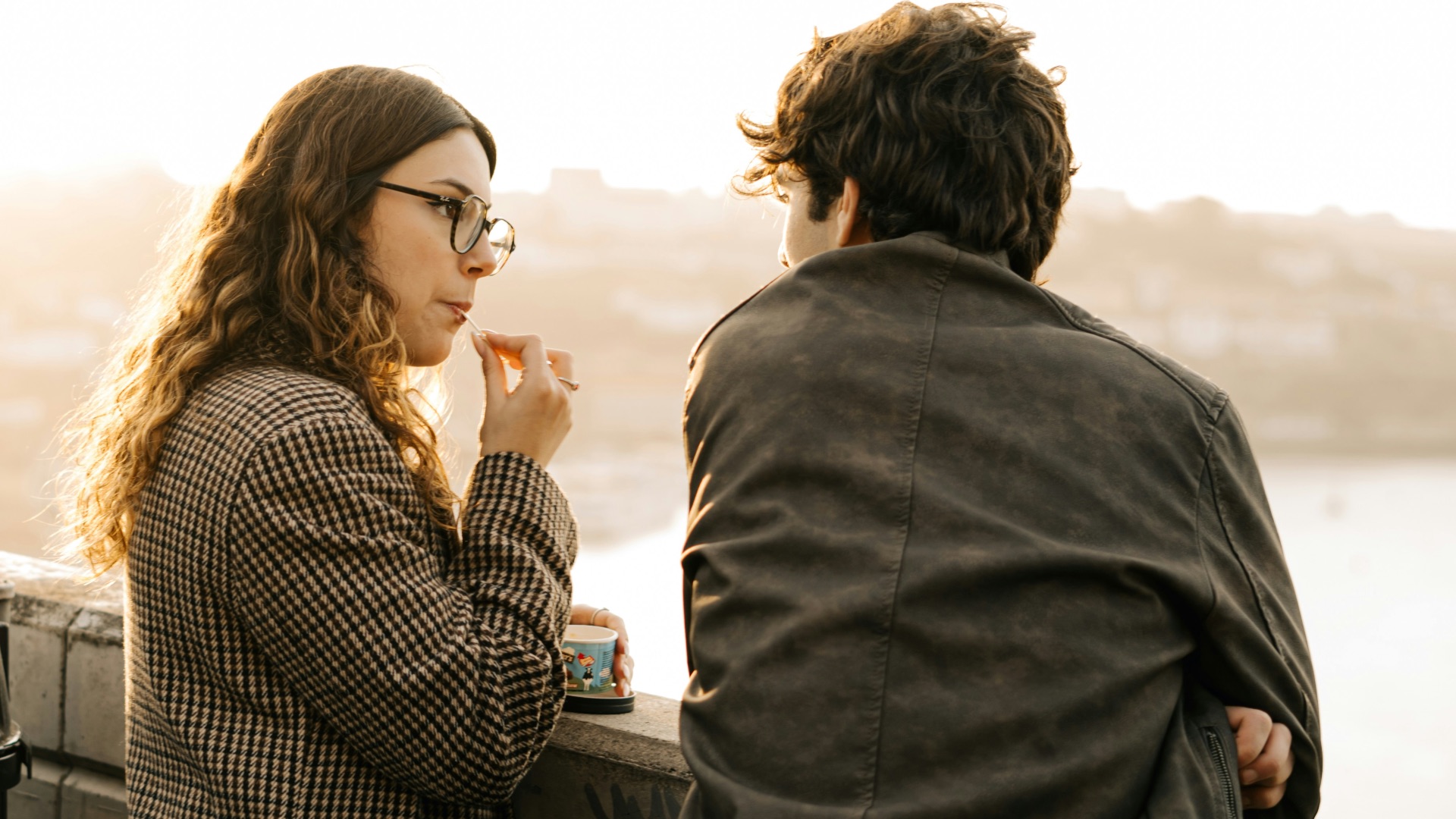 A man and a woman standing next to each other