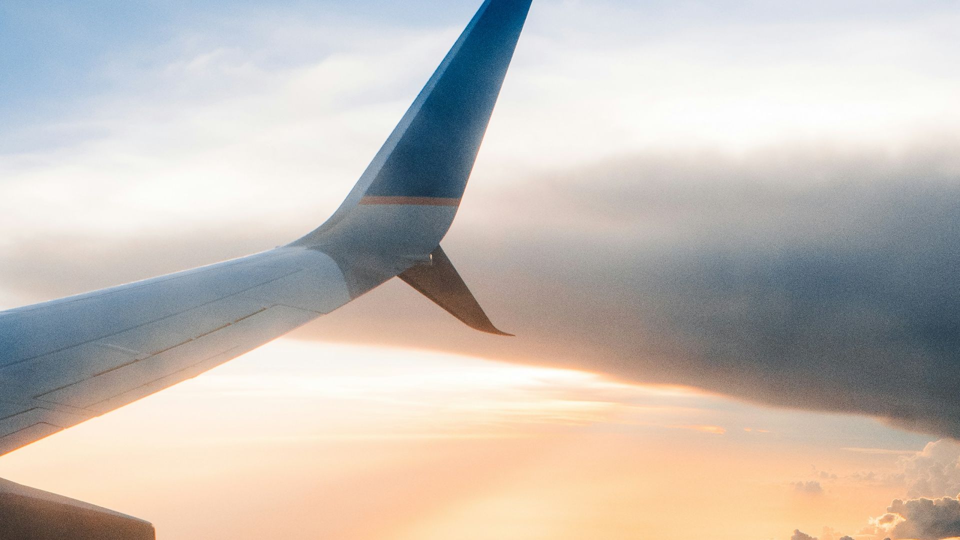 airplane on sky during golden hour