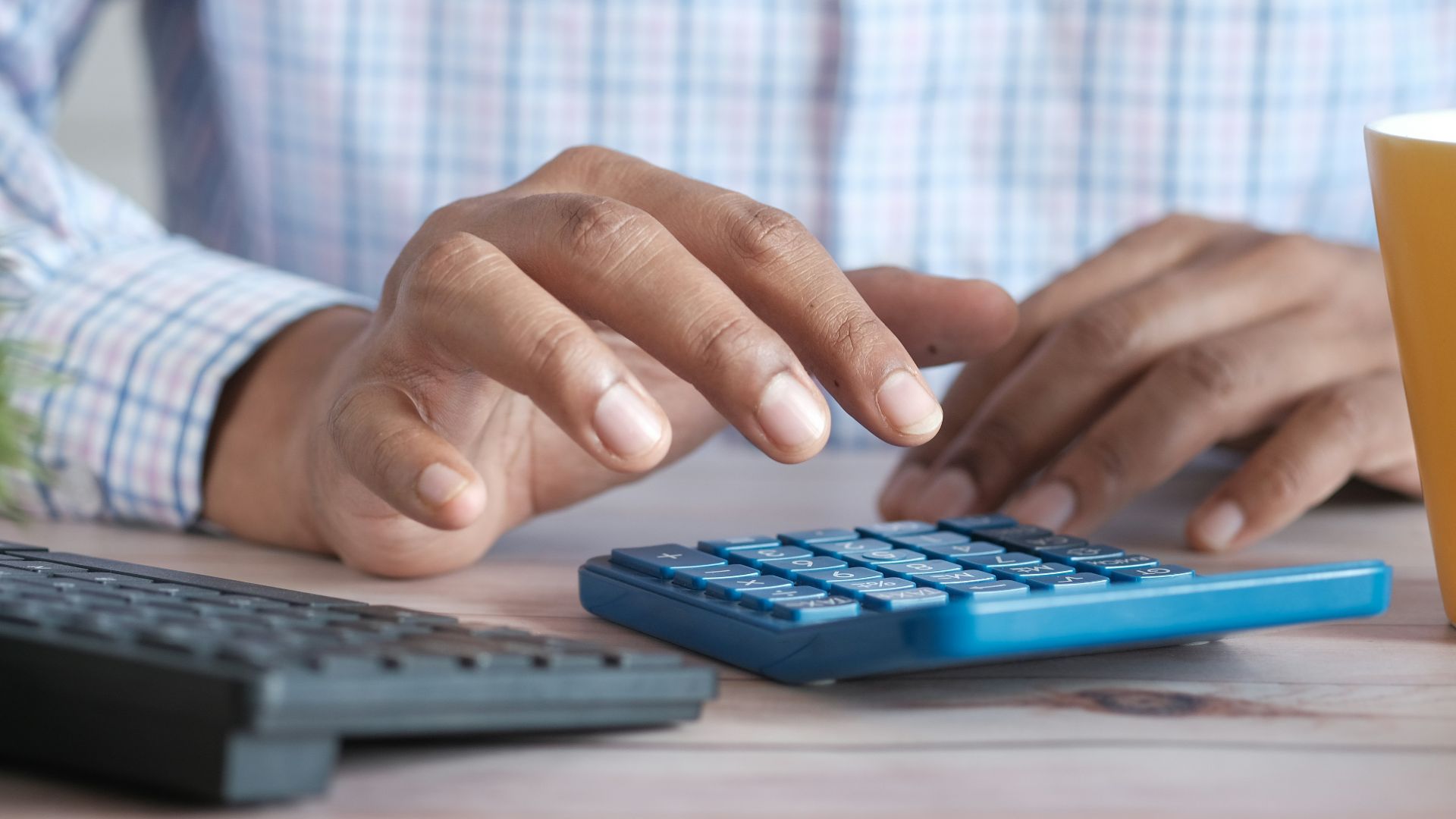 person using black computer keyboard