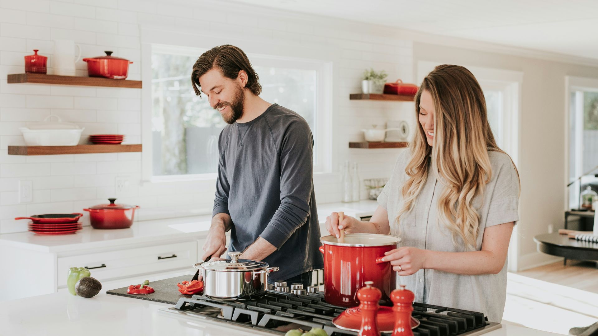 man and woman on kitchen