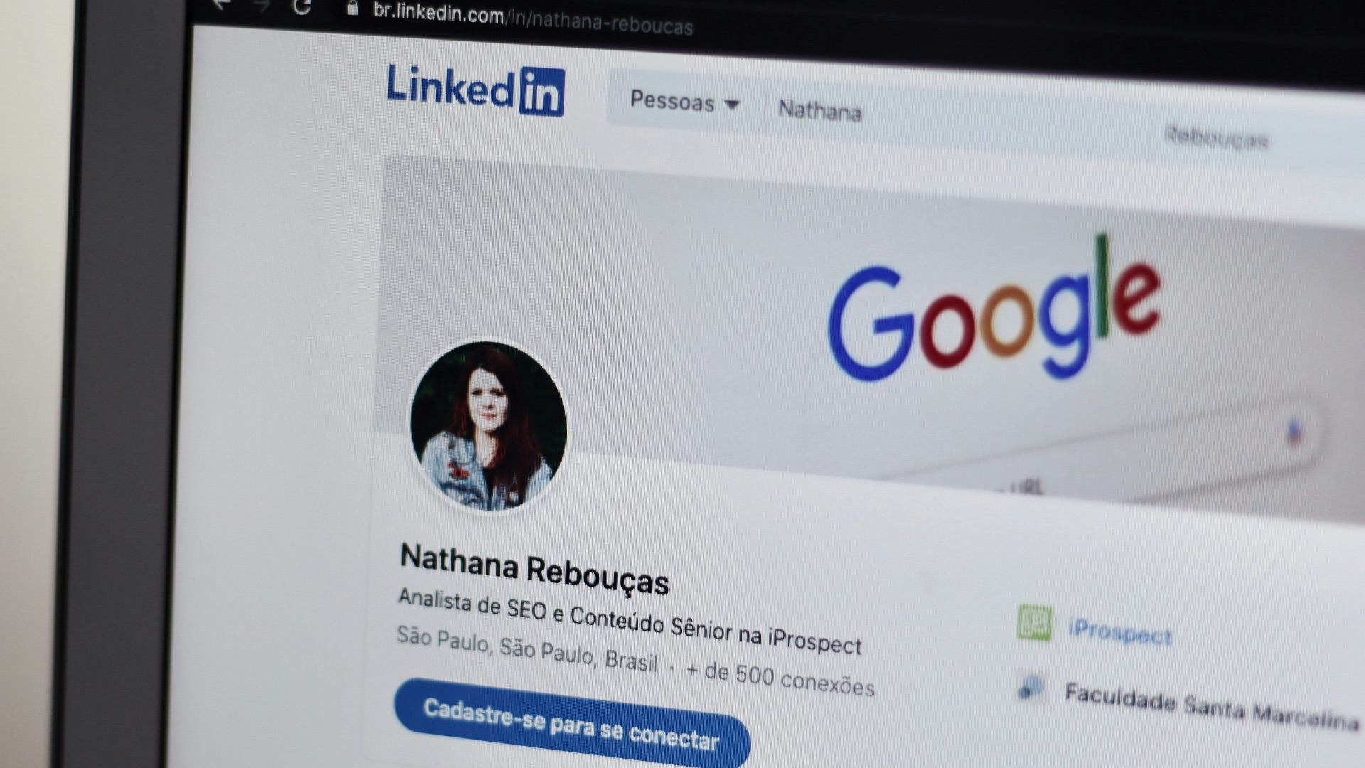 black tablet computer turned on displaying facebook