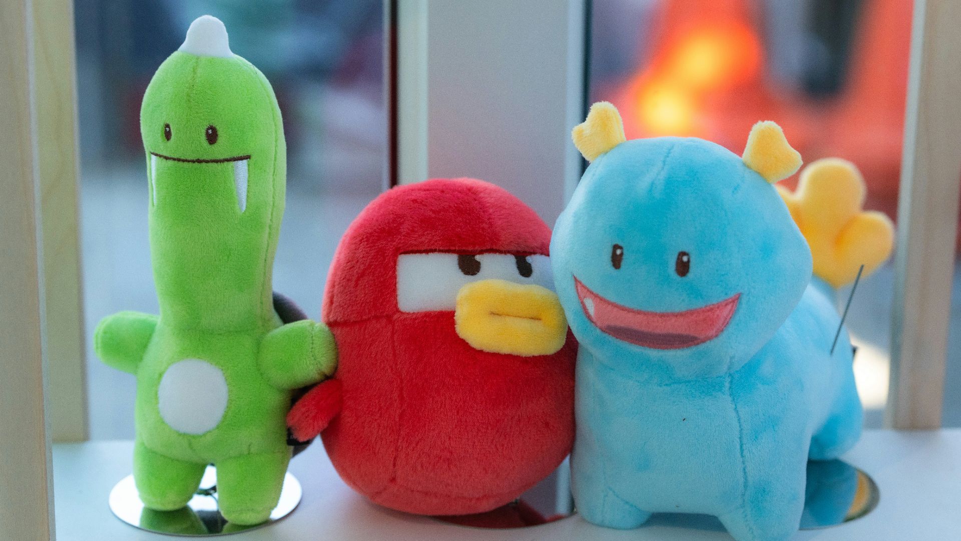 A group of stuffed animals sitting next to each other