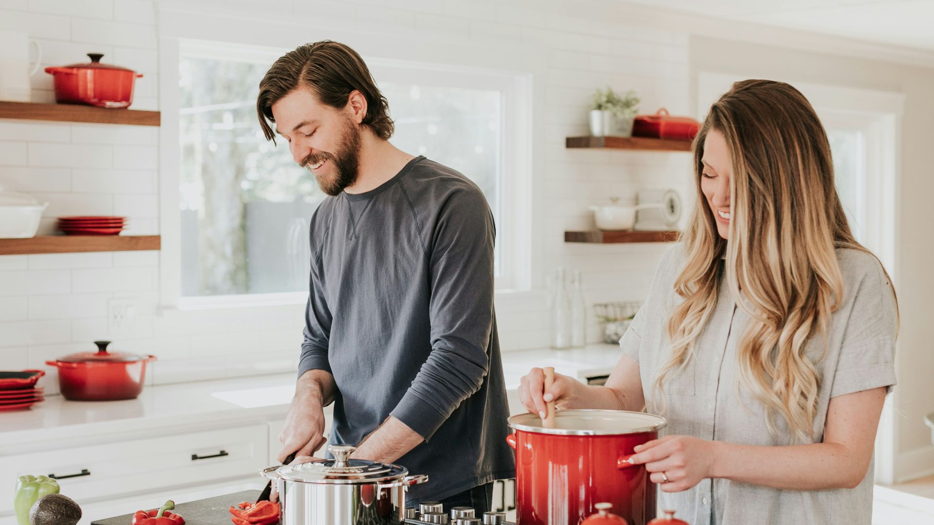 man and woman on kitchen