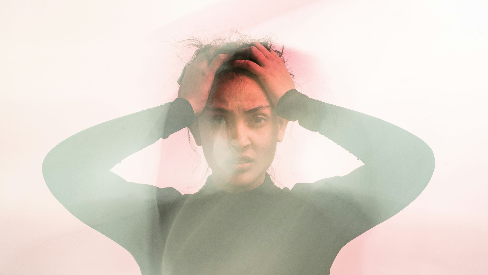 woman in gray turtleneck long sleeve shirt