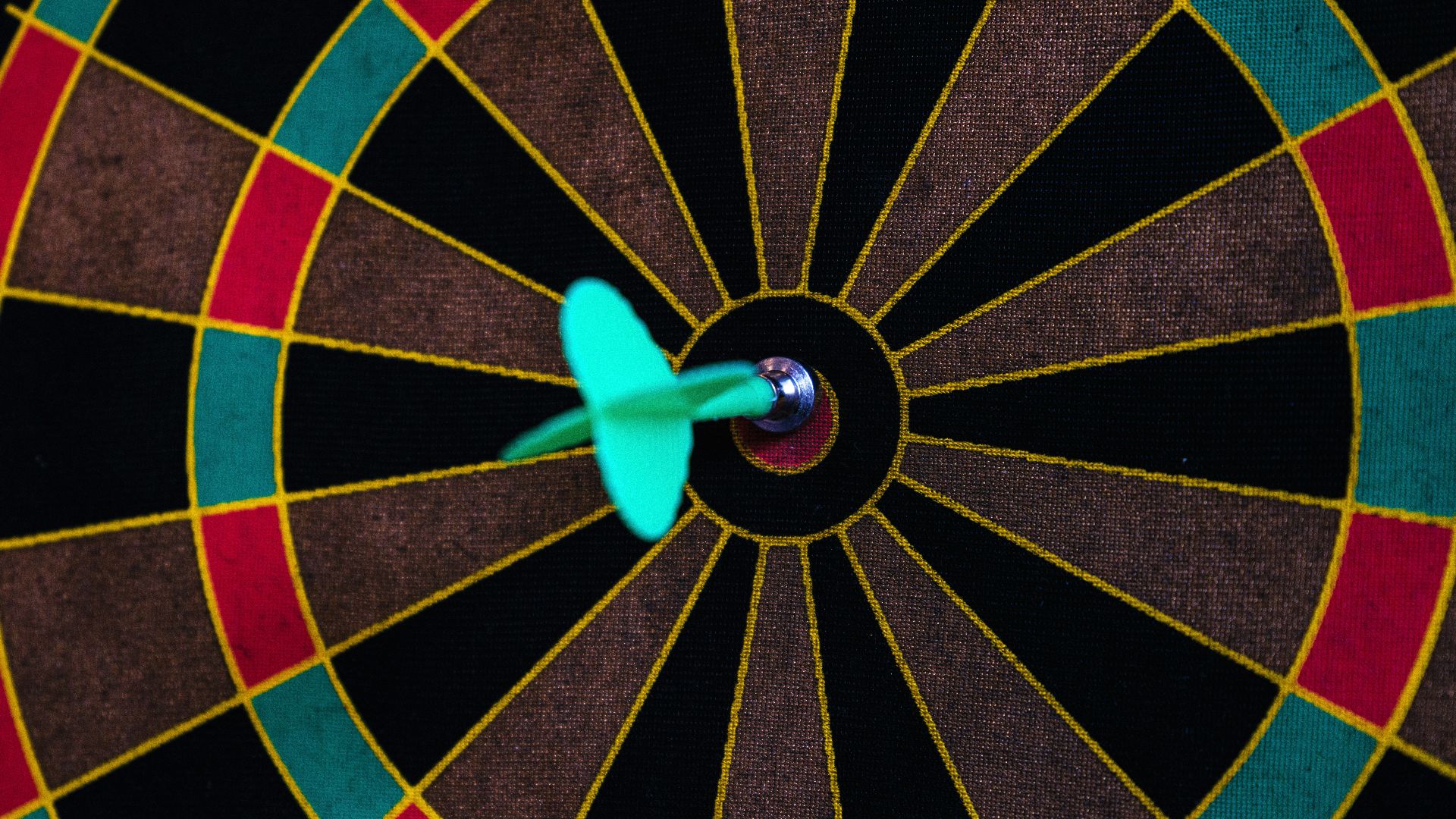 a dart board with darts