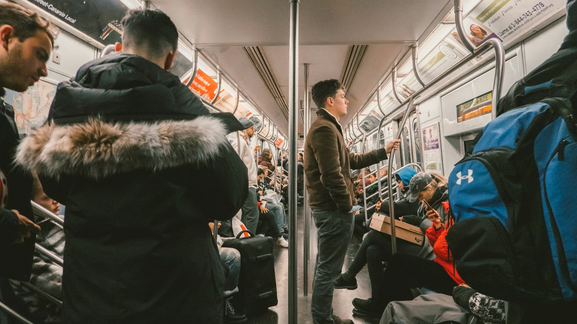 man riding train