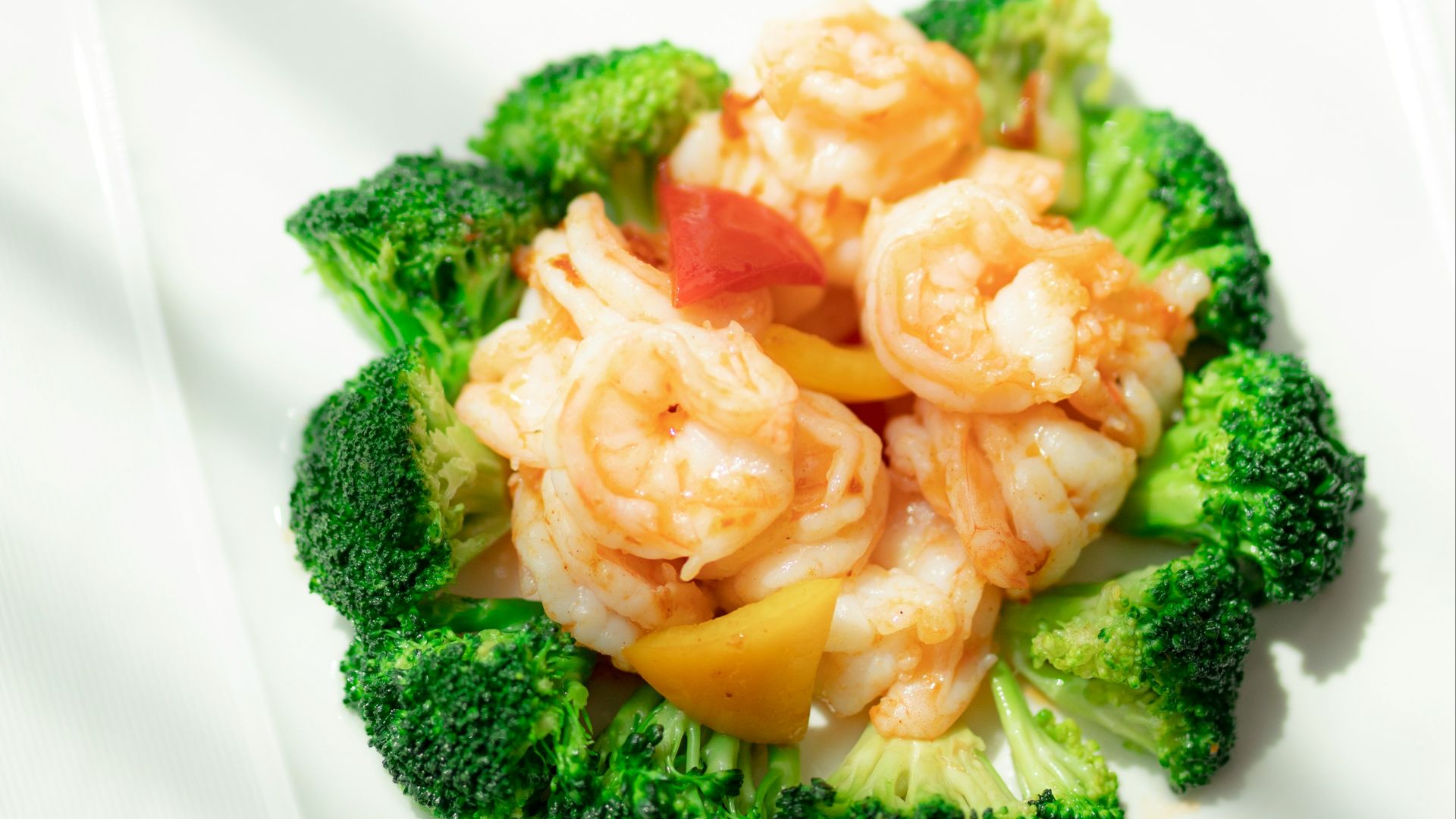 green and yellow broccoli on white ceramic plate