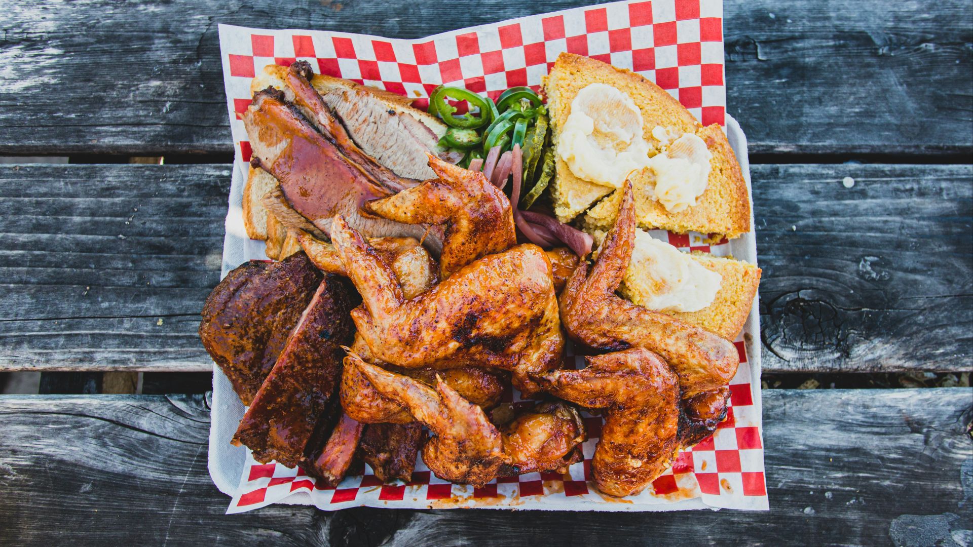 fried food on red and white checkered textile