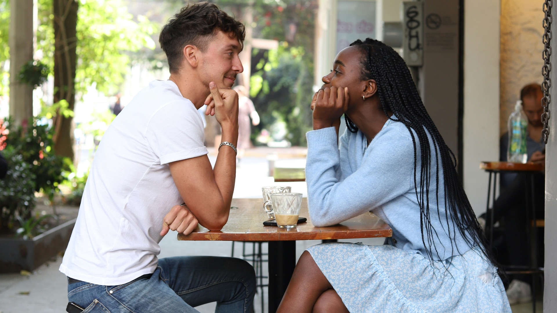 a man and a woman sitting at a table