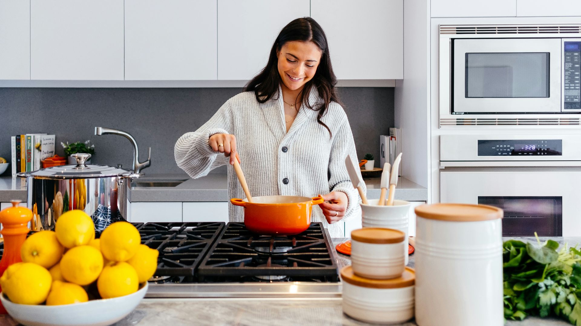 woman cooking inside kitchen room