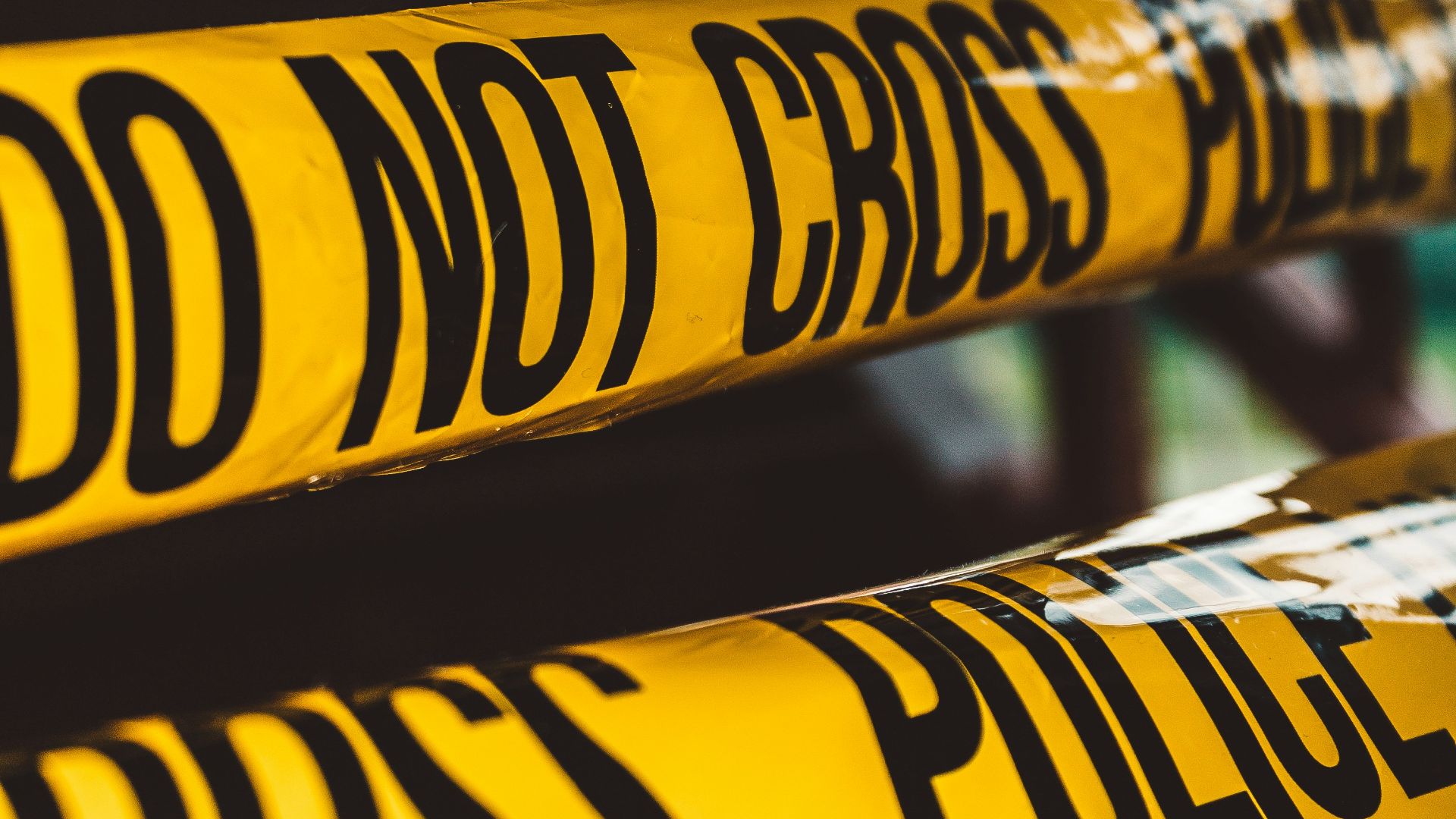 do not cross police barricade tape close-up photography