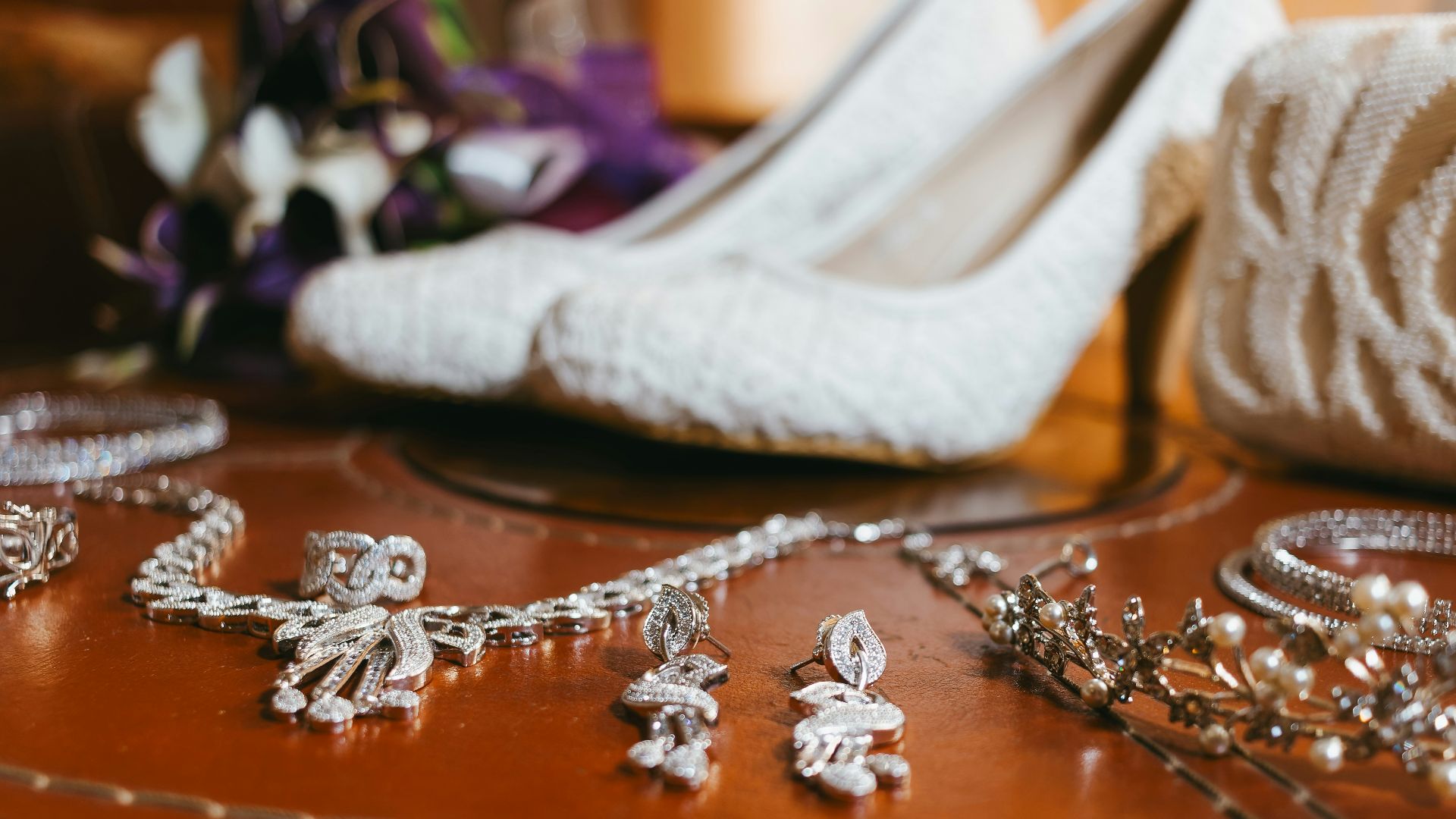 a bunch of jewelry sitting on top of a table