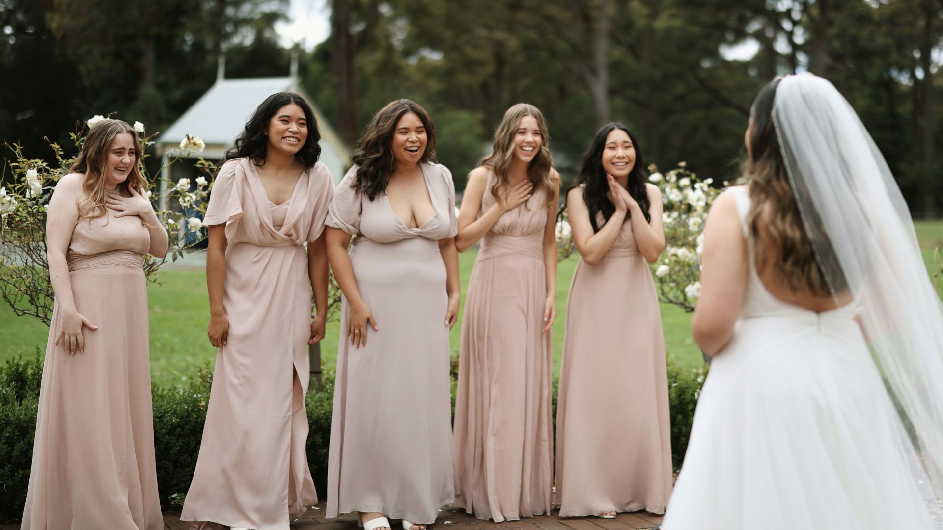 a group of women standing next to each other