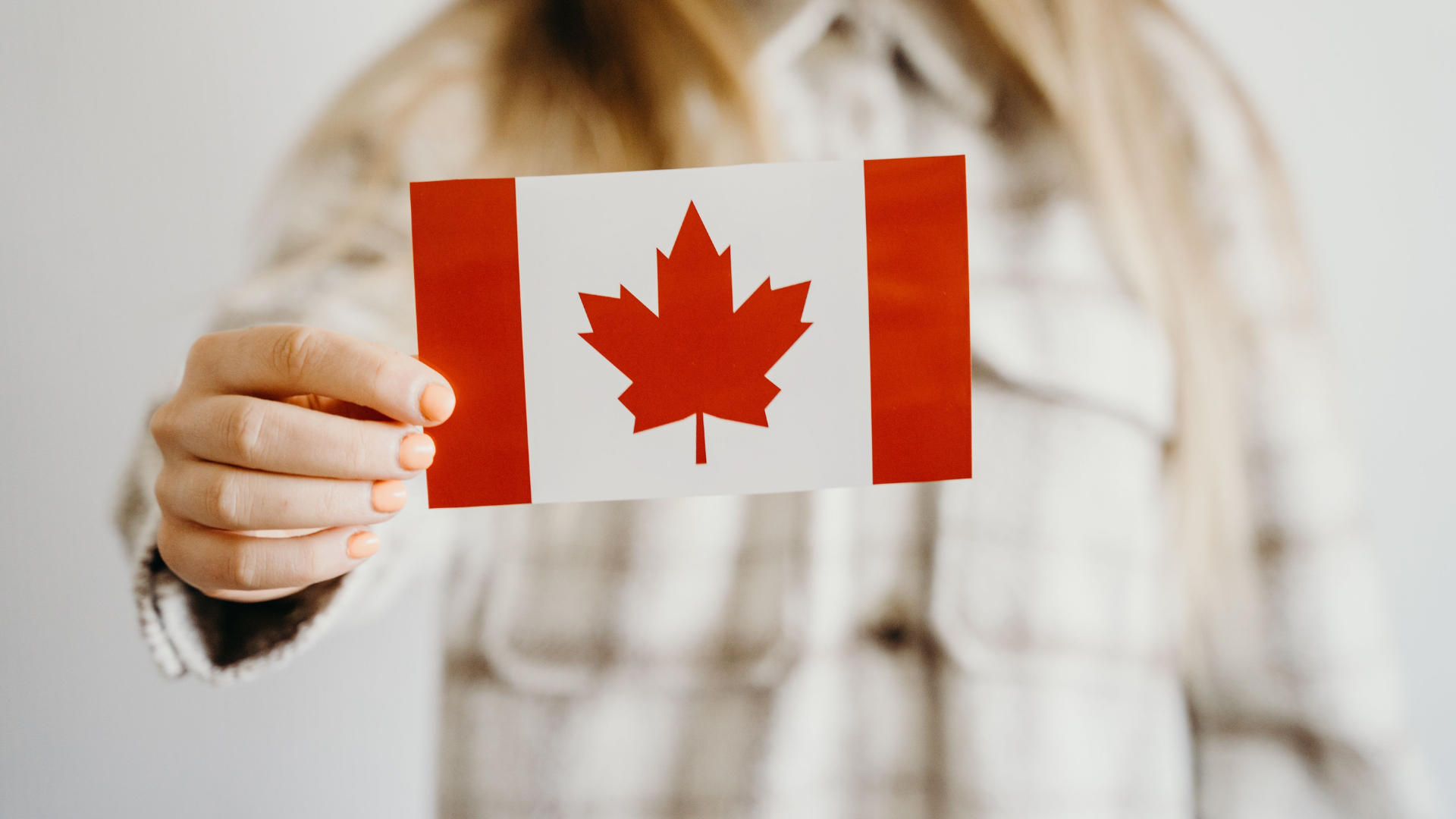 canadian-flag-held-out-thumb-rss.png