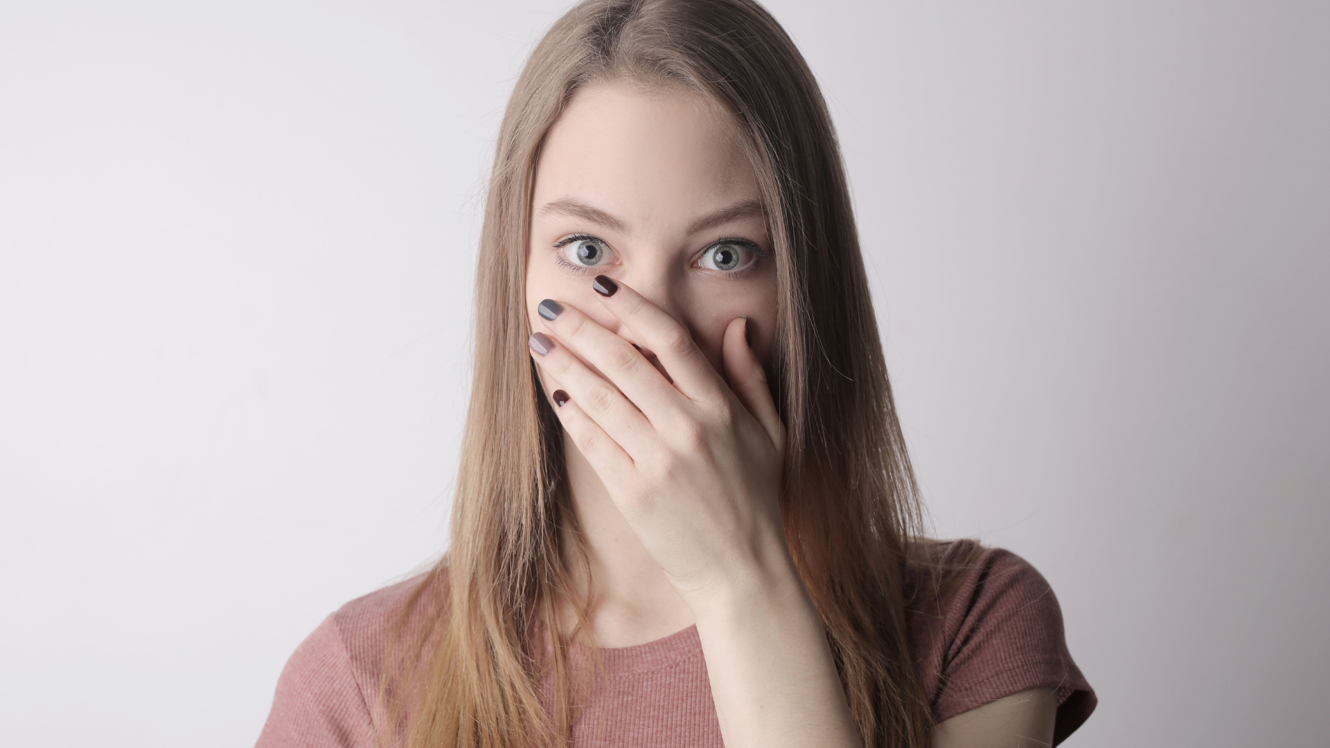 woman-hand-over-mouth-thumb-rss.png
