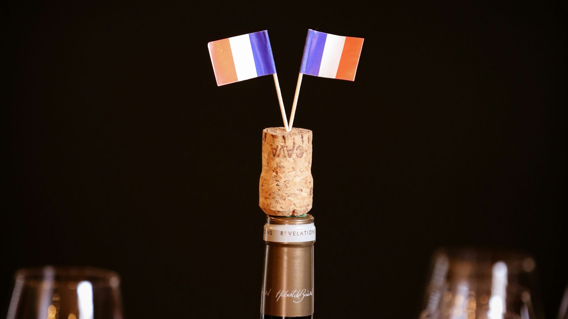 a bottle of wine and glasses