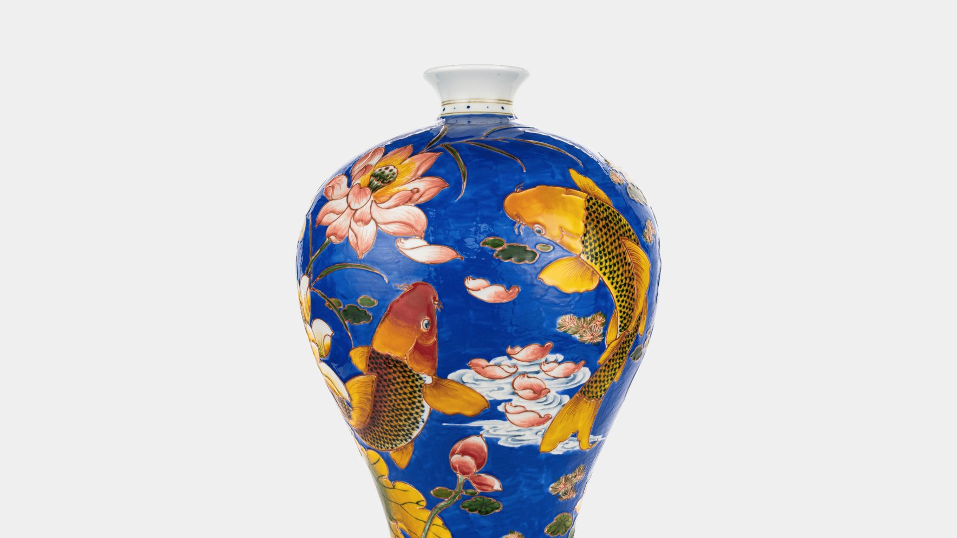 A blue vase sitting on top of a white table