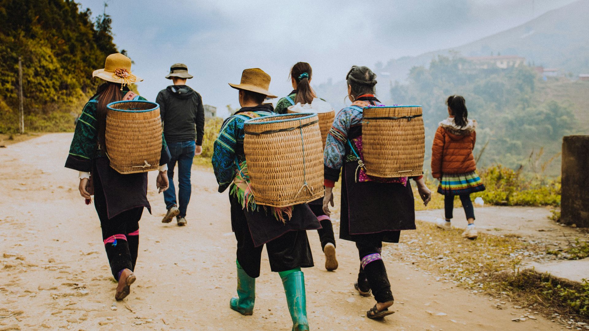 people walking on brown sand during daytime