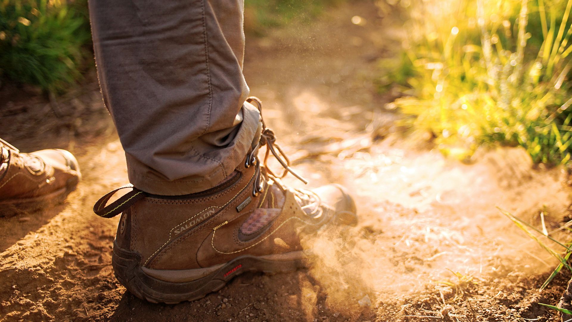 person wearing pair of brown sneakers