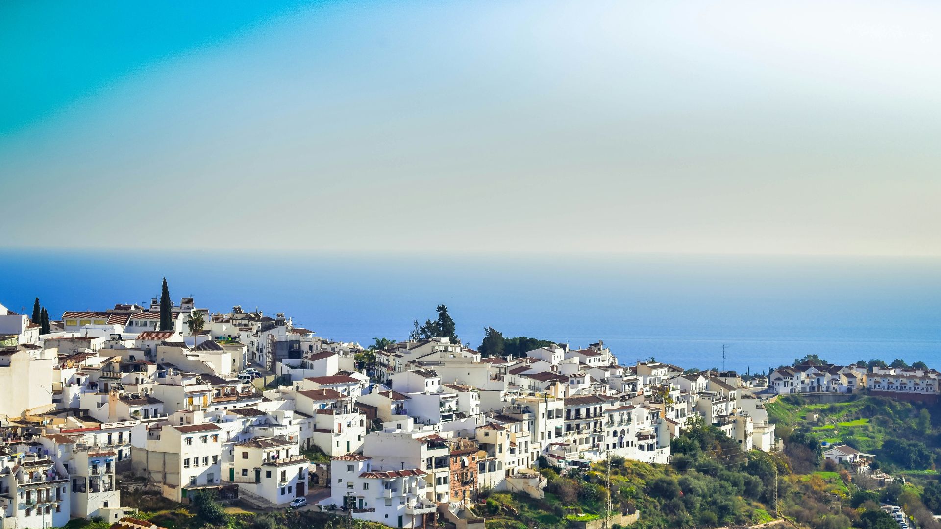 a view of a town from a hill