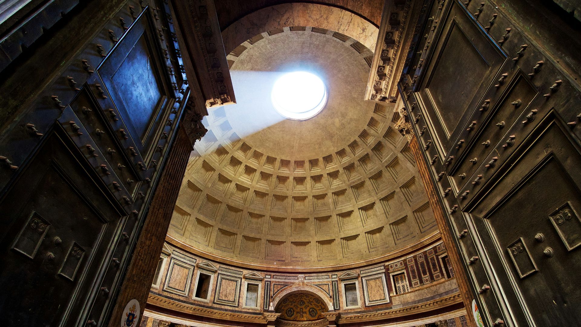 low angle brown concrete dome building