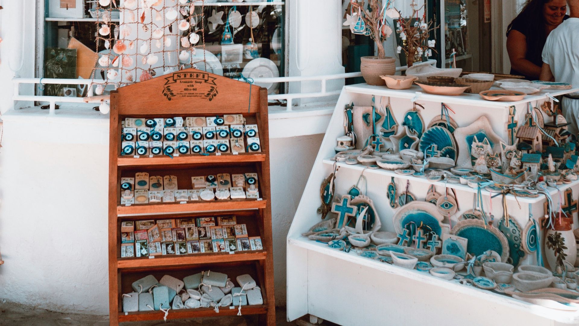 a store front with a display of chinaware