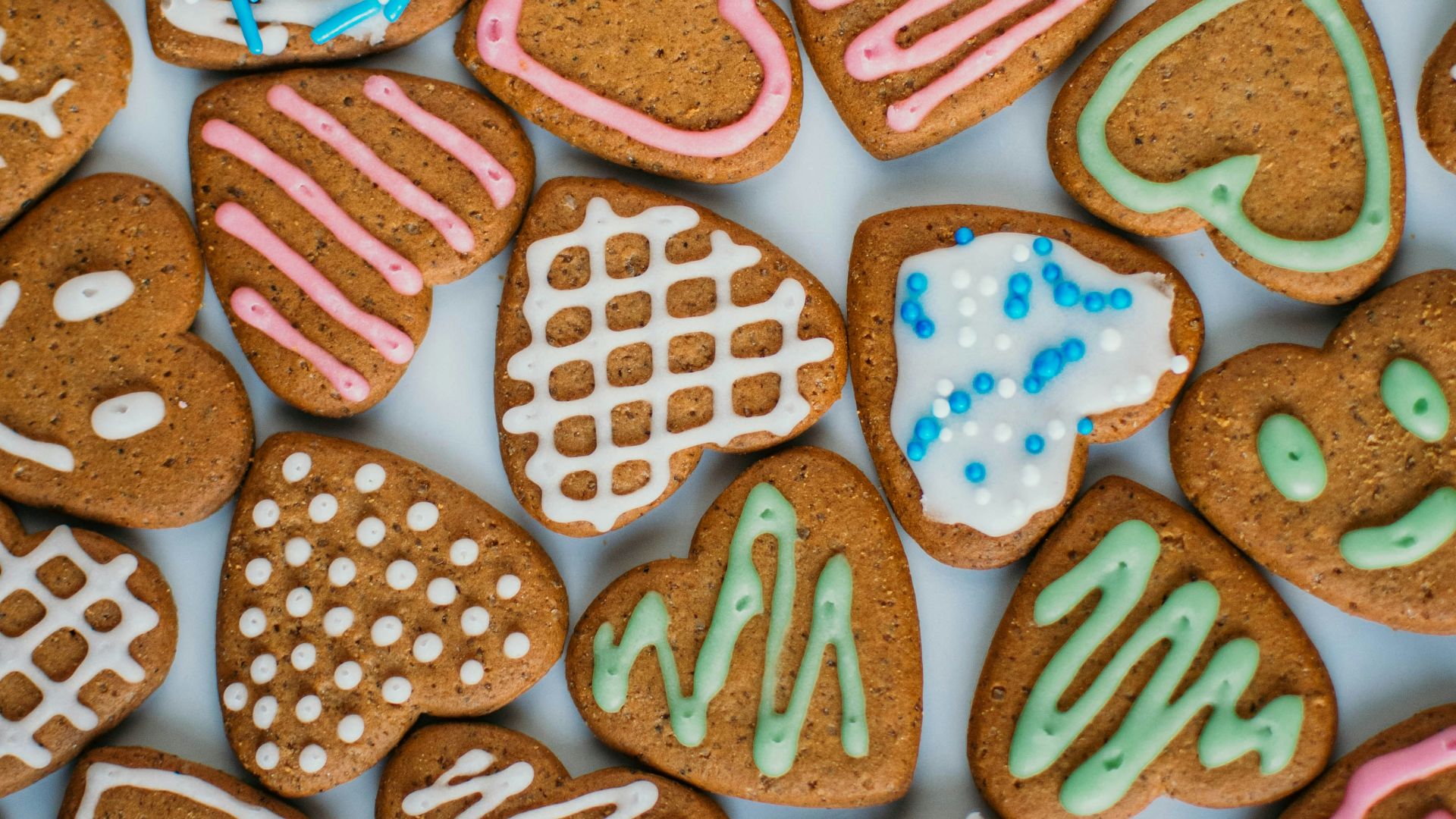 a white plate topped with lots of cookies