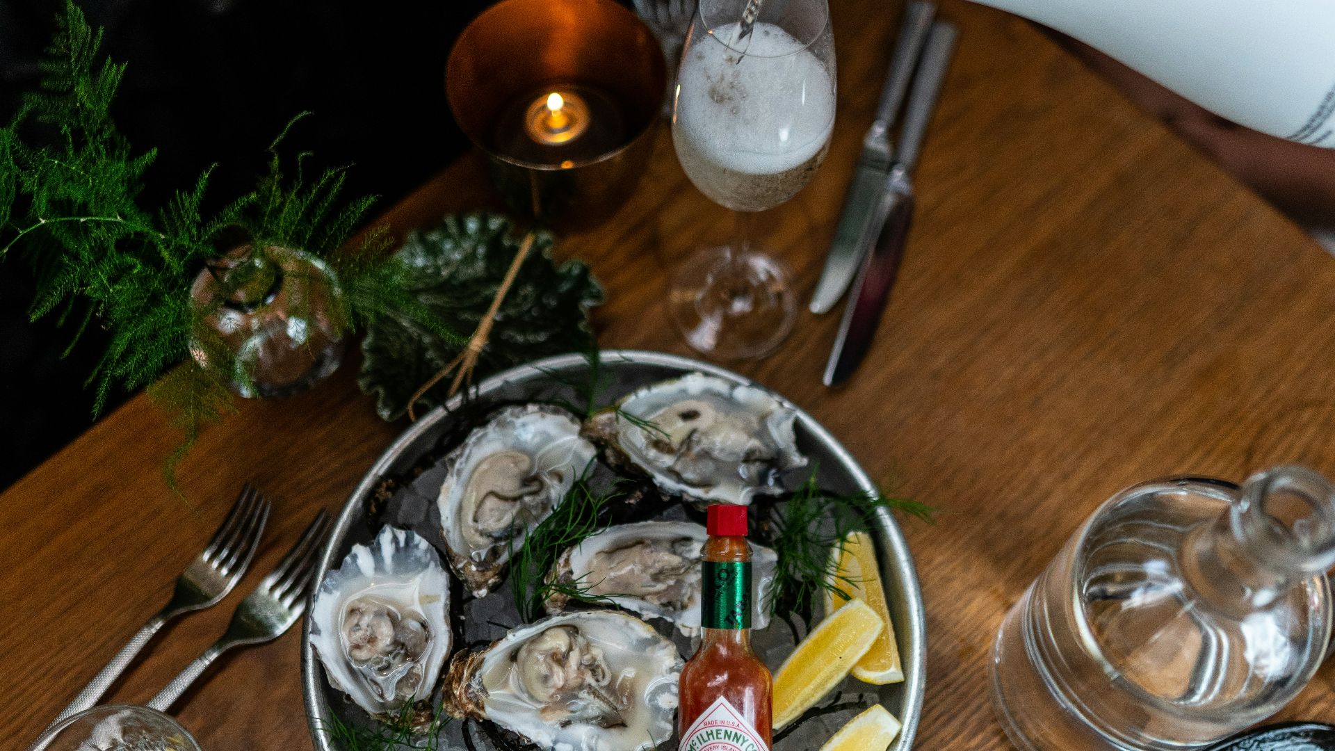 clear glass bowl on brown wooden table
