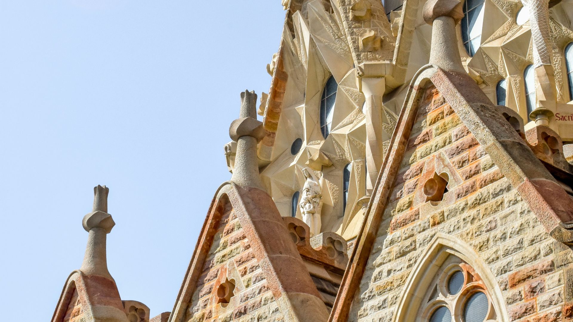 A very tall building with a clock on it's side