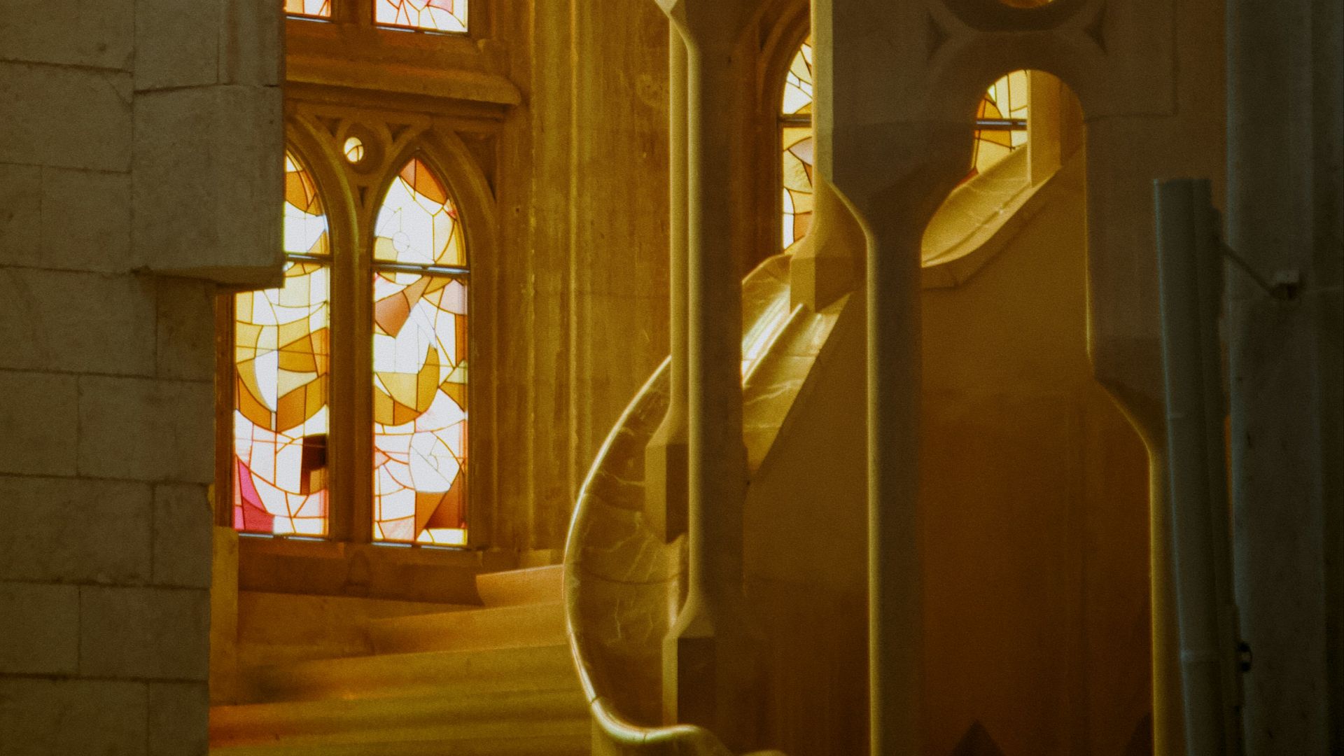 A church with stained glass windows and stairs