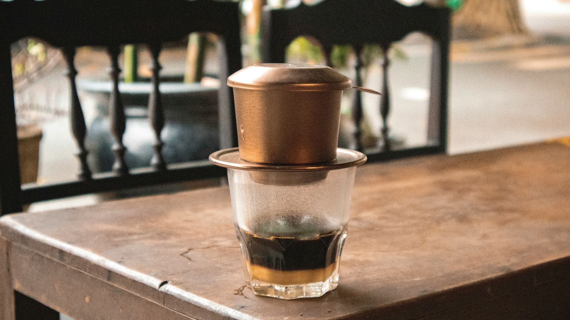 a glass of water on a table