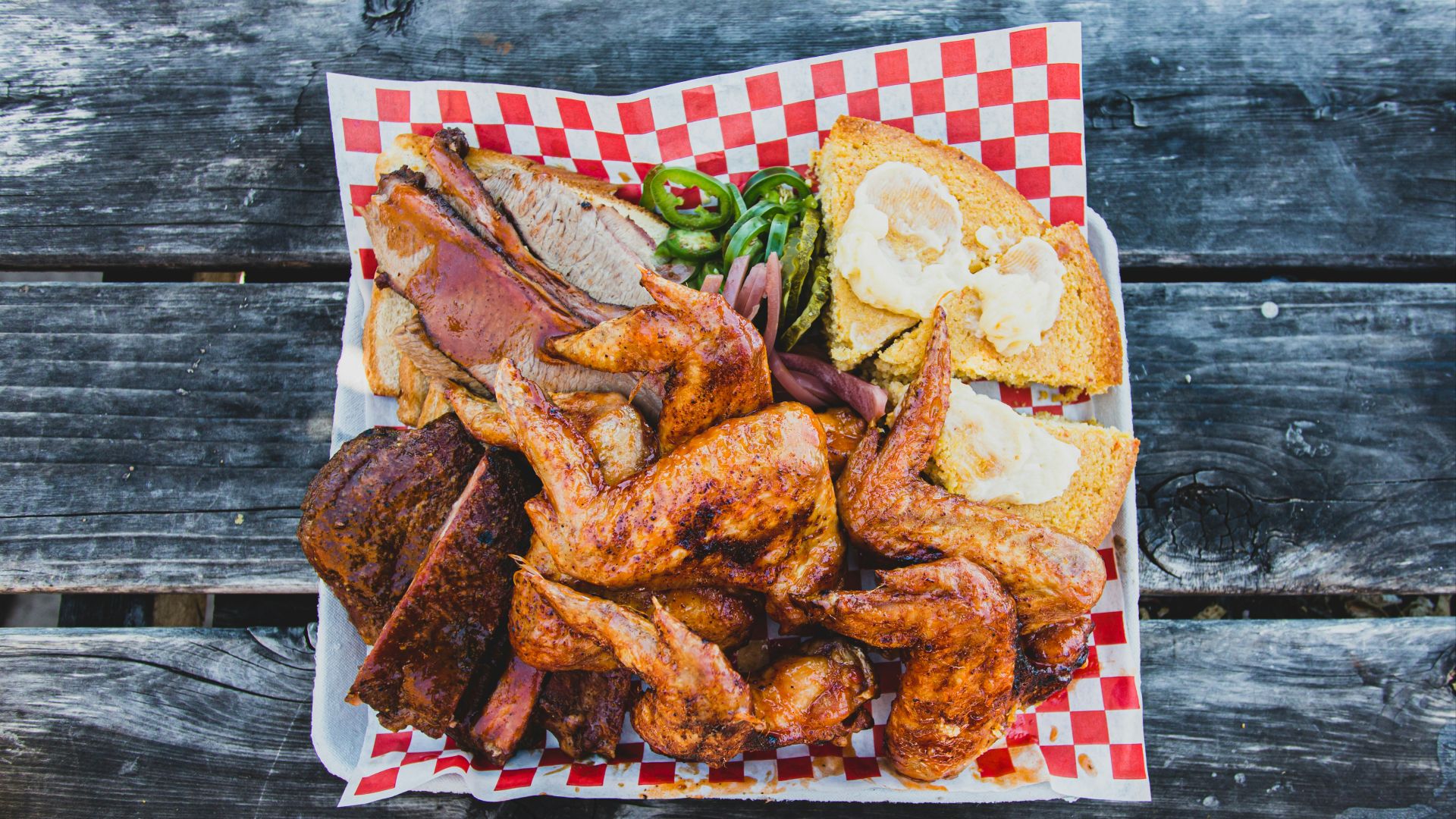 fried food on red and white checkered textile