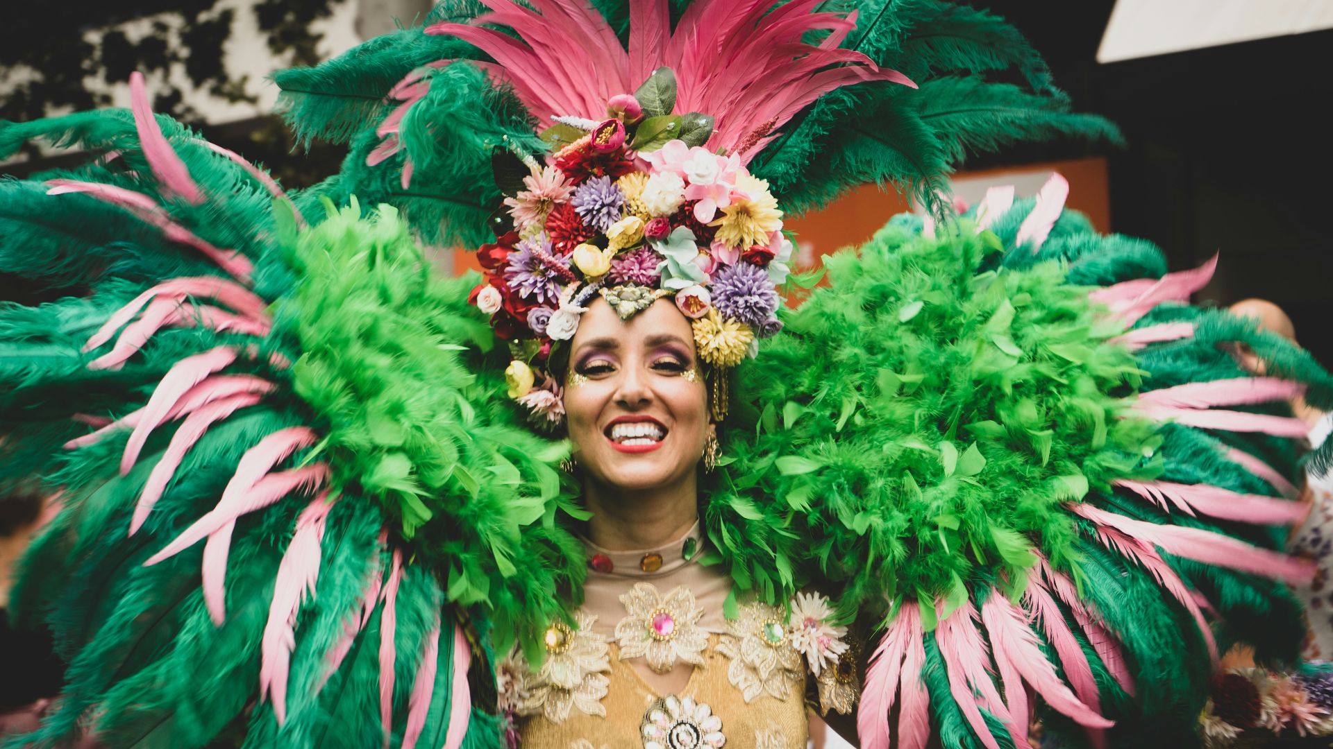 a woman in a green and pink costume
