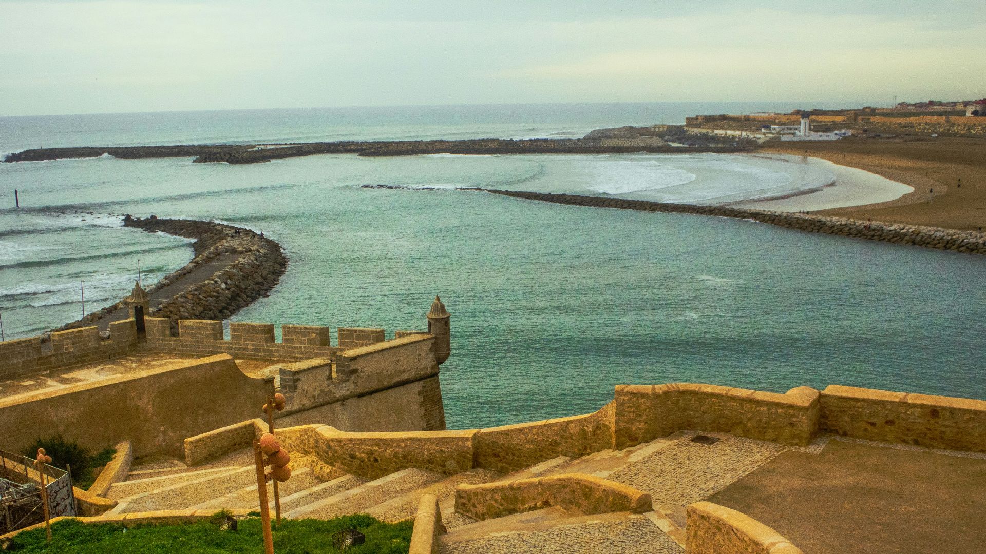 a set of steps leading to a beach